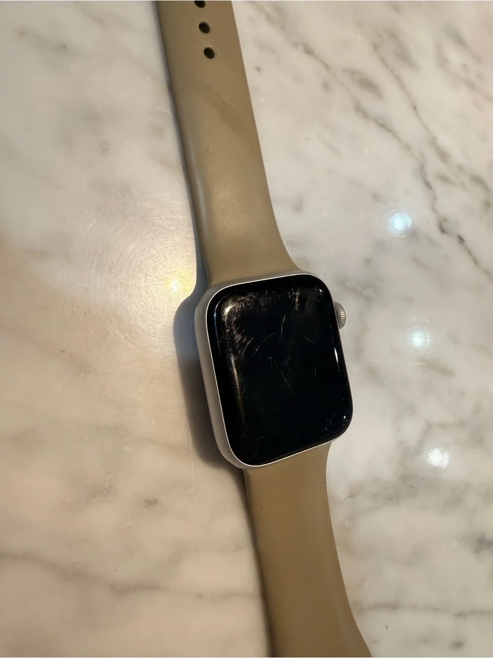 Apple Watch with Beige Silicone Band and Silver Case